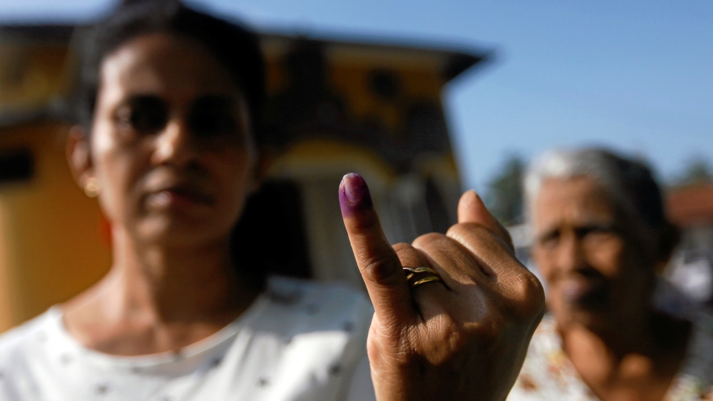 More than 8,300 members are due to be elected [Dinuka Liyanawatte/Reuters]
