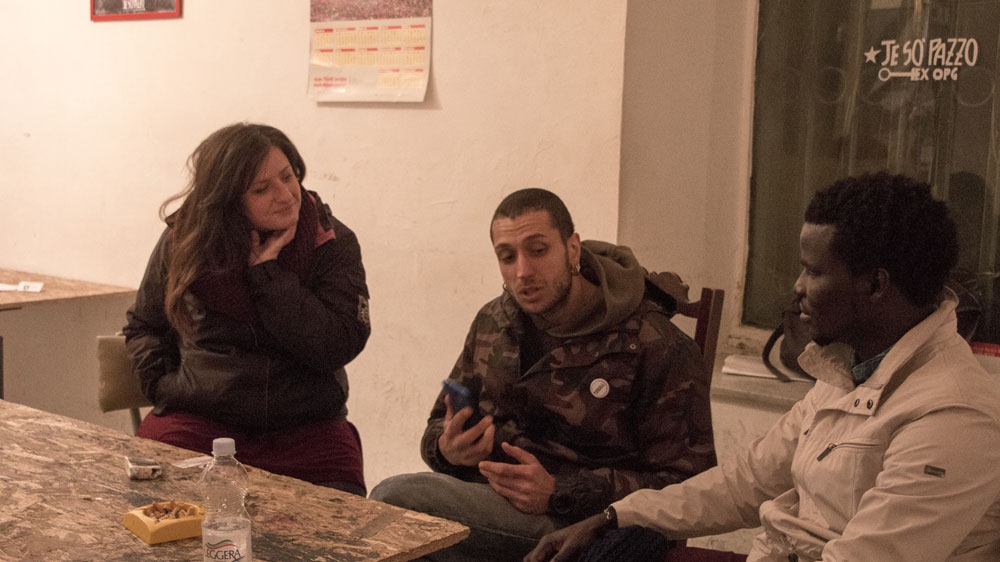 From left: Volunteers Silvia, Saverio and Malik pictured at the OPG [Ylenia Gostoli/Al Jazeera]