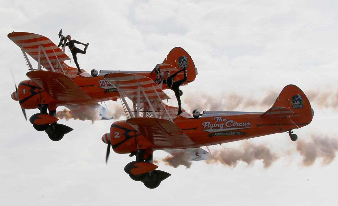 British female members of the Aerosuperbatics Wingwalkers, perform aerobatic stunts for the first time in the Philippines during the four-day 22nd International Hot Air Balloon festival at Clark, Pamp