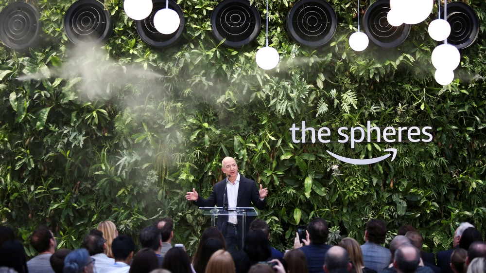 Amazon founder and CEO Jeff Bezos gives some closing comments after opening the new Amazon Spheres, with some help from Alexa, during an opening event at Amazon's Seattle headquarters in Seattle, Washington, US [Lindsey Wasson/Reuters]