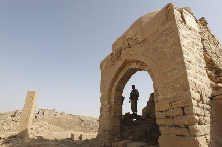 A man stands inside a monument at the historical town of Baraqish in Yemen''s al-Jawf province after it was taken over by pro-government forces from Houthi fighters