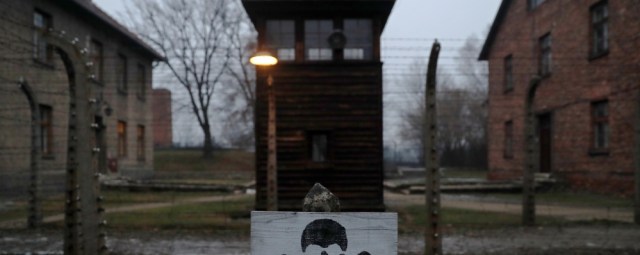 Russian ‘megalomania’ in Ukraine war cited at death camp memorial