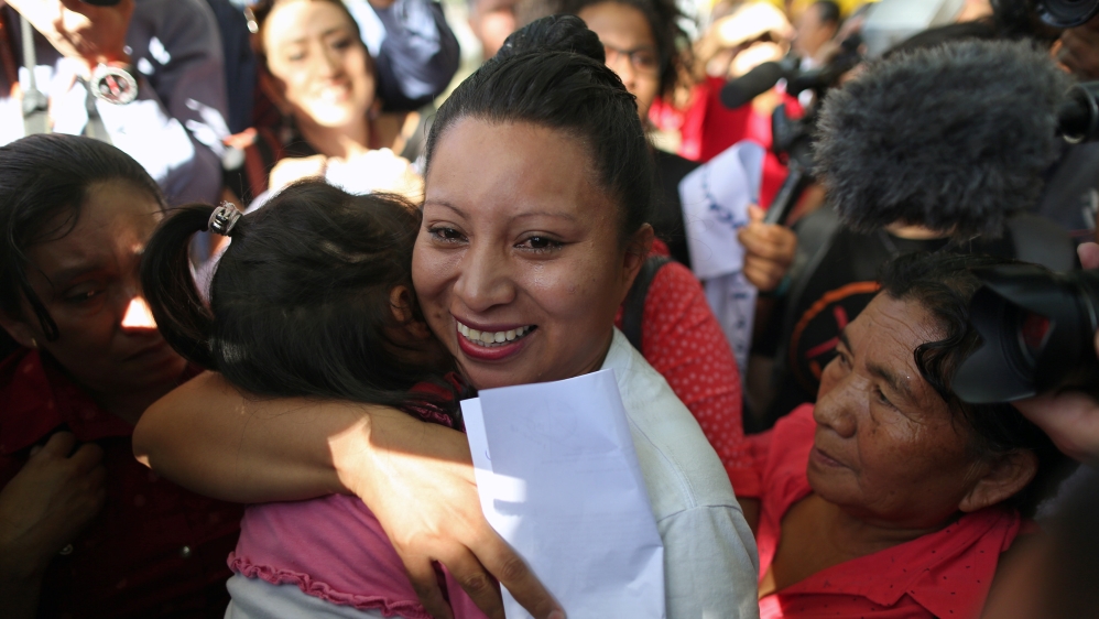 Teodora del Carmen Vasquez hugs her niece as she walks out of jail after her 30-year sentence was commuted by the Supreme Court of El Salvador [File: Jose Cabezas/Reuters] 