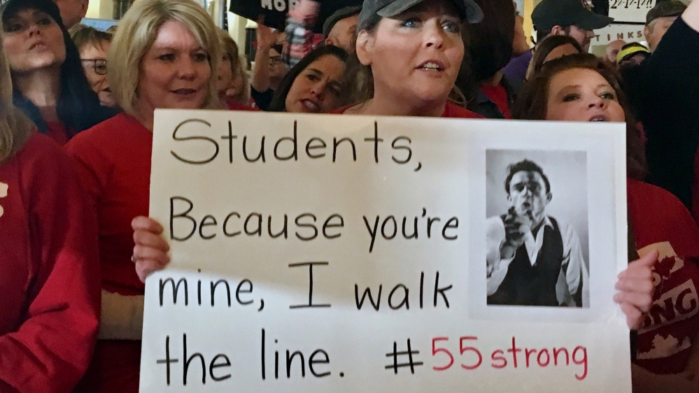 Teachers risk fines by continuing the walkout [John Raby/AP Photo]