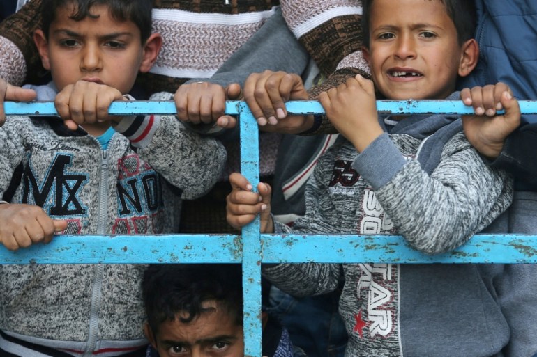 Children attend the funeral of two Palestinian teenagers in Rafah in the southern Gaza Strip