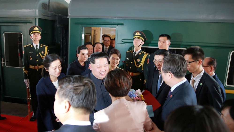 The China visit was Kim's first known foreign trip since he assumed power in 2011 [KCNA/via Reuters]
