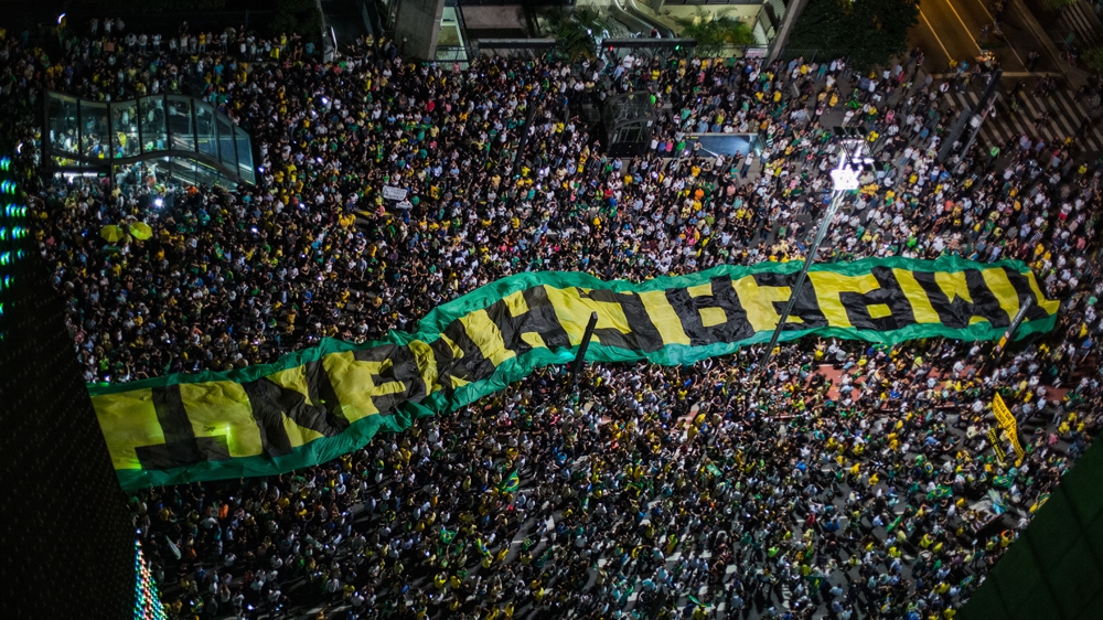 Demonstrators protest for the impeachment of President Dilma Rousseff and also against corruption being investigated involving resource diversion and money laundering in Petrobras scandal of corruption on March 16, 2016, in Sao Paulo, Brazil [Victor Moriyama/Getty] 