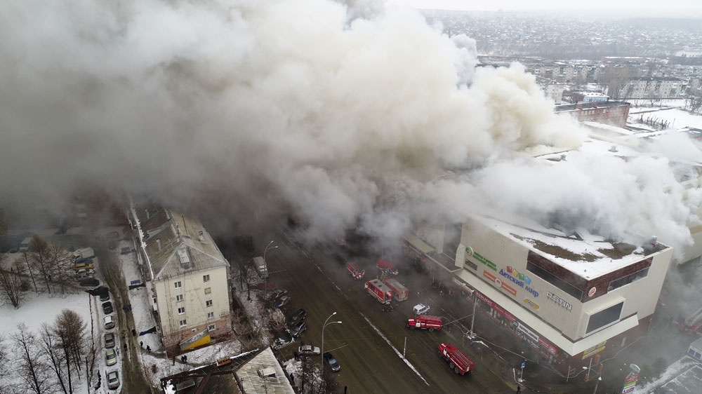 The fire erupted at Winter Cherry mall on Sunday [Russian Ministry for Emergency Situations via AP]