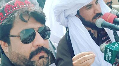 In support of Pashteen's cause, Hashim Khan wears the red-and-black hat and changed his last name to 'Pashteen' [Al Jazeera]