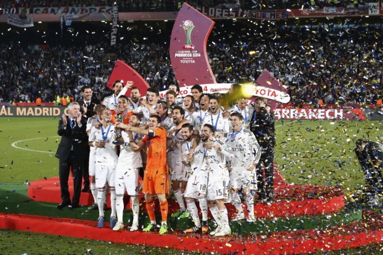 Real Madrid players celebrate winning the Club World Cup final soccer match against San Lorenzo at Marrakesh