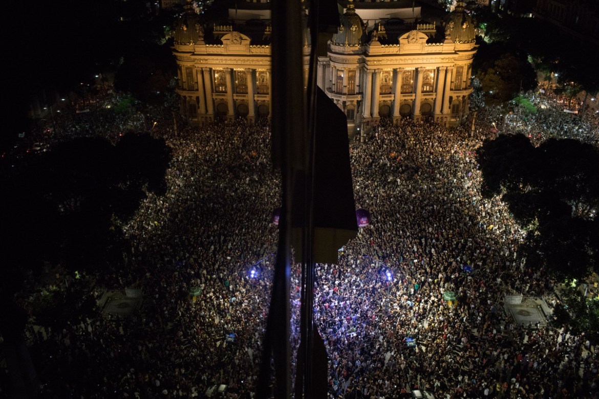 Thousands gather in front the Municipal Theater in downtown Rio de Janeiro, during a protest against the death of councilwoman Marielle Franco, who was gunned down the night before by two unidentified