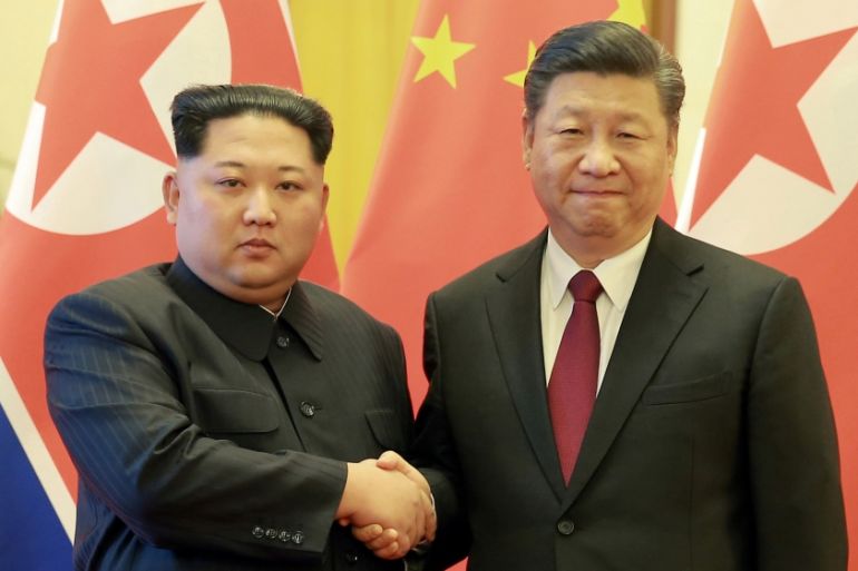 North Korean leader Kim Jong Un with Chinese President Xi Jinping