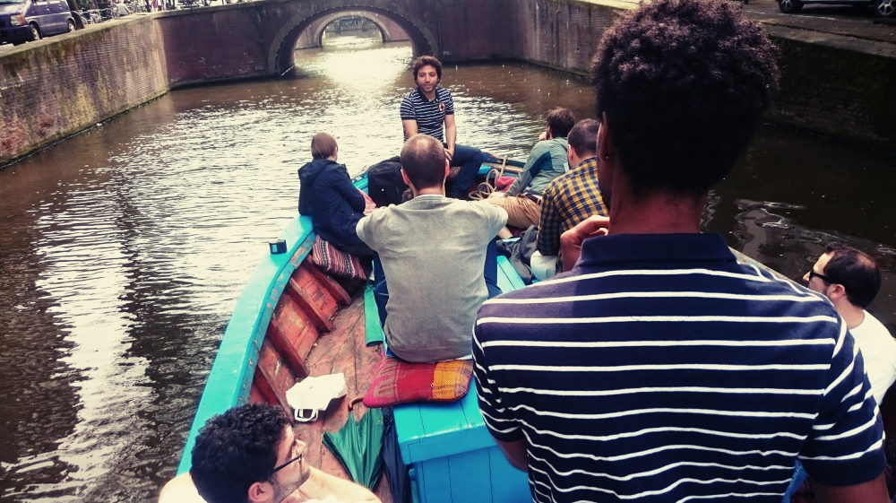 Refugee captains tell tourists their stories during canal cruises [Courtesy: Mediamatic]