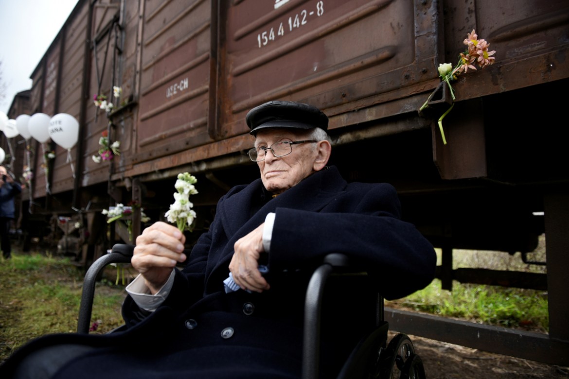 Moshe Haelion, a 93-year old Jewish survivor of the Holocaust, takes part in a memorial marking the 75th anniversary of the first deportation of Jews from Thessaloniki to Auschwitz, in Thessaloniki, G