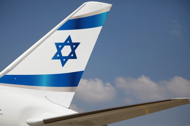 An Israeli flag is seen on the first of Israel''s El Al Airlines order of 16 Boeing 787 Dreamliner jets, as it lands at Ben Gurion International Airport, near Tel Aviv