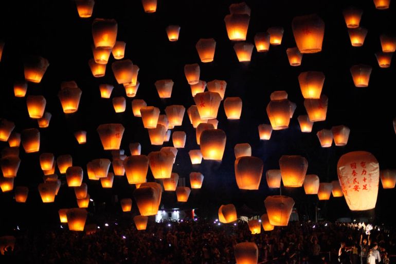 Thousands of flying lanterns hand-written with different people’s wishes are released into the sky in Ping Xi’s Sky Latern Festival. Sky lanterns are scheduled to be released together at eight differe