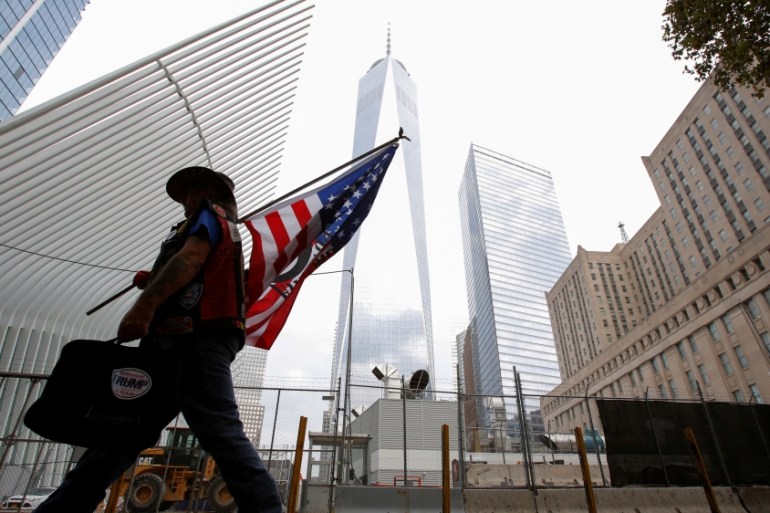 A man arrives at the World Trade Center complex on the morning of the 15th anniversary of the 9/11 attacks in Manhattan, New York
