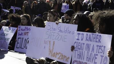 Students gather in New York City's Washington Square Park for the national walkouts [Andre Roman Medina/Al Jazeera] 
