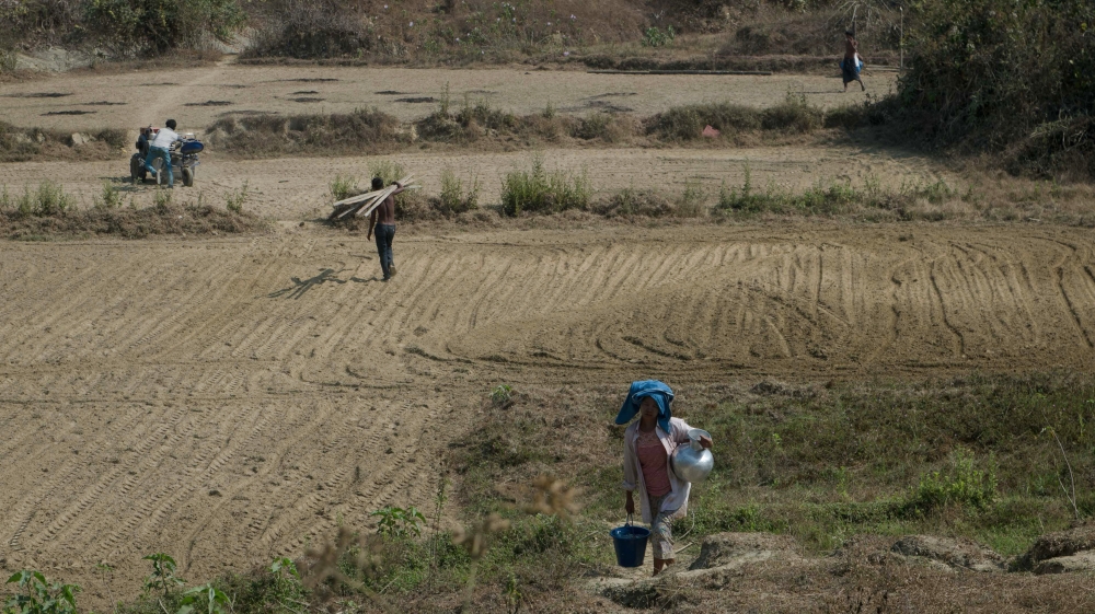 New migrants hope to eventually own land, a prospect previously beyond their reach [Phyo Hein Kyaw/AFP]