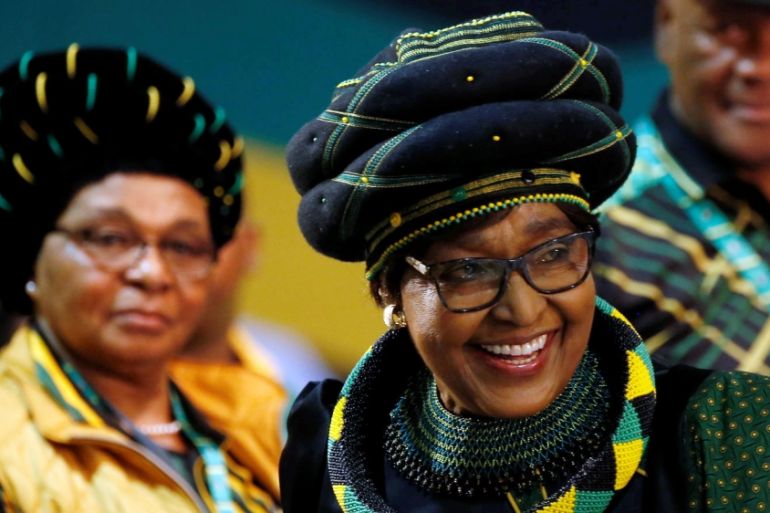 Winnie Madikizela Mandela, ex-wife of former South African president Nelson Mandela, smiles as she arrives for the 54th National Conference of the ruling ANC at the Nasrec Expo Centre in Johannesburg