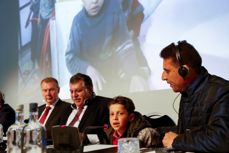 An unidentified boy from Douma, Syria, speaks at a news conference in the Hague