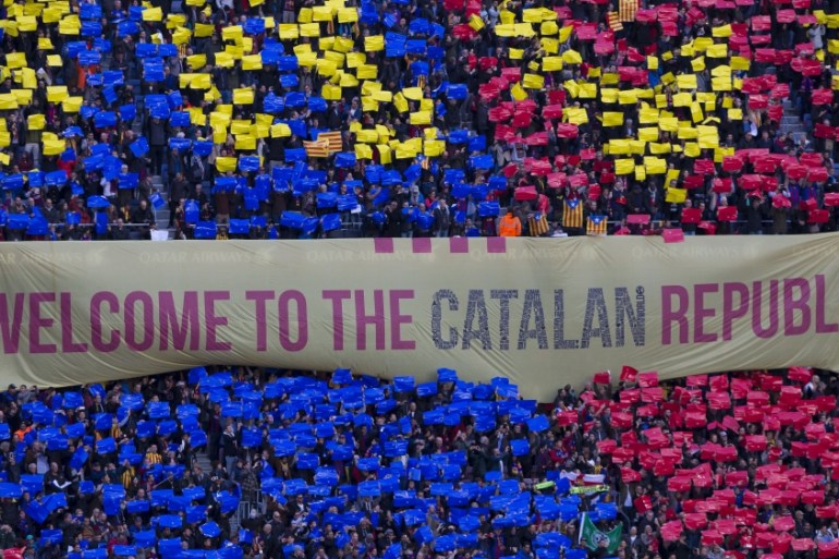 FC barcelona''s supporters hold a gigant pro-independence banner during the spanish football league match between FC Barcelona and Real Madrid in Barcelona (Photo by Miquel Llop/N