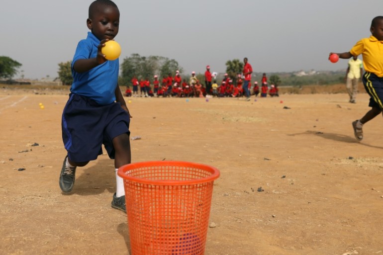 School children take part in inter house sports event in Karmajiji, along Abuja''s airport road