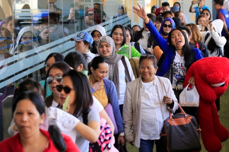 Overseas Filipino Workers (OFW) from Kuwait arrive at the Ninoy Aquino International Airport in Pasay city, Metro Manila