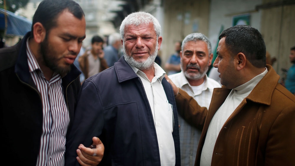 Relatives of al-Batsh mourned in the northern Gaza Strip on Friday [Mohammed Salem/Reuters]