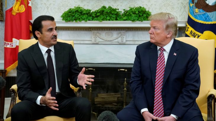 U.S. President Donald Trump meets Qatar''s Emir Sheikh Tamim bin Hamad al-Thani in the Oval Office at the White House in Washington