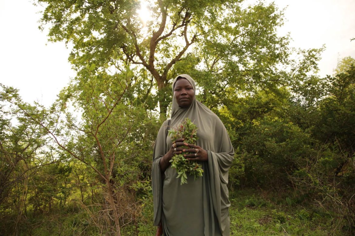 Aisha learned about medicinal plants from her father. Her expertise as a medicine woman has earned her respect from fellow hunters. Copyright: Rosie Collyer