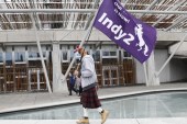 A man holds a pro-independence flag outside Scotland's Parliament in Holyrood, Edinburgh, Britain [Russell Cheyne/Reuters]
