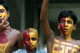 Indian soccer fans, with their body painted in the colour of their East Bengal club [File/Reuters]