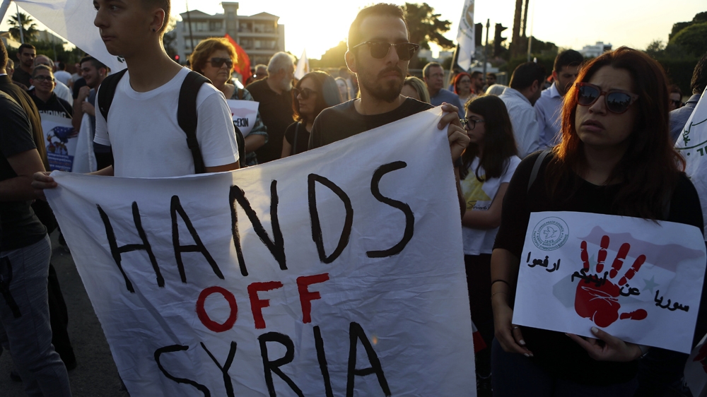 Demonstrators gather in Nicosia, Cyprus to denounce US-led air strikes in Syria [File: AP]