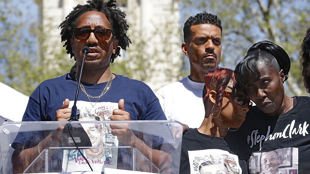 Curtis Gordon speaks at a rally aimed at ensuring Clark's memory and calling for police reform [Rich Pedroncelli/AP Photo]