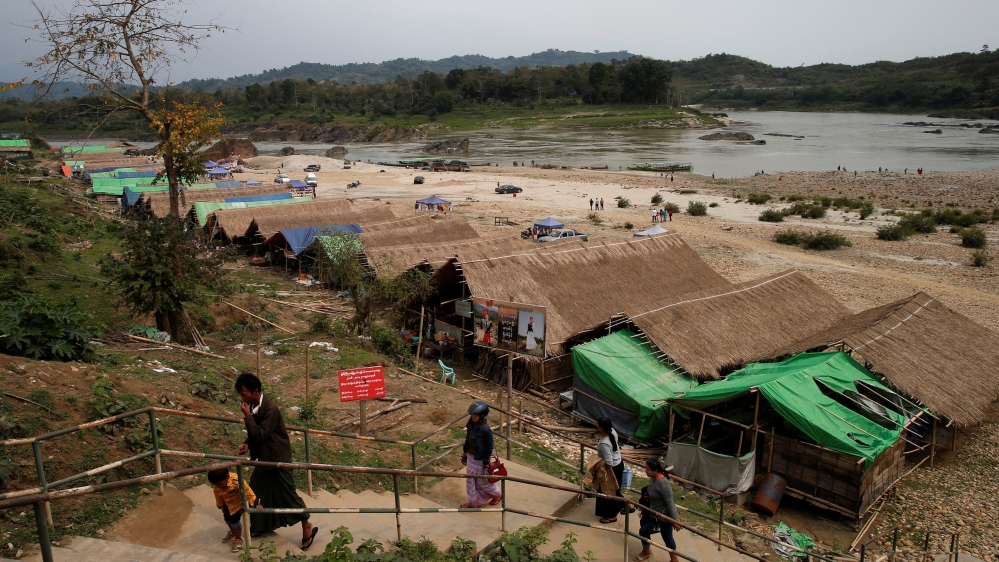 Temporary residents are seen at Myitsone, at the confluence of the Mali and Nmai rivers, outside Myitkyina capital city of Kachin state, Myanmar March 30, 2017 [Soe Zeya Tun/Reuters]