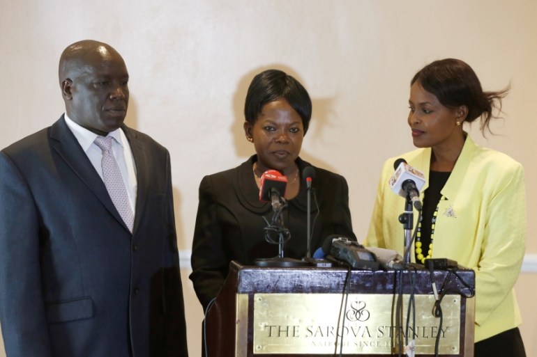 Kenyan commissioners Nkatha Maina, Margaret Mwachanya and Paul Kurgat attend a news conference where they announced their resignation in Nairobi