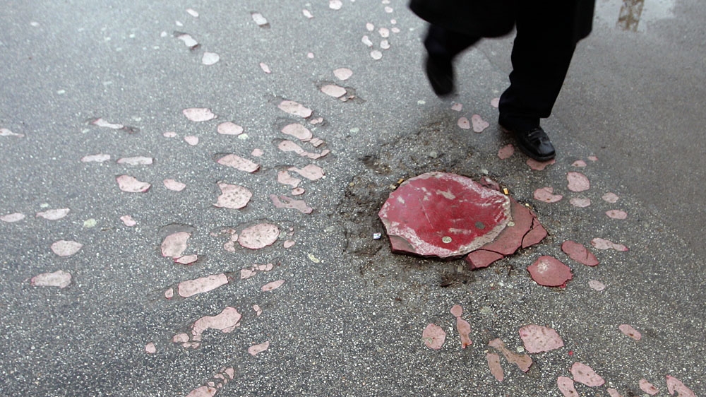 The scars of Bosnia's past litter the streets of Sarajevo, sometimes literally, in the form of 