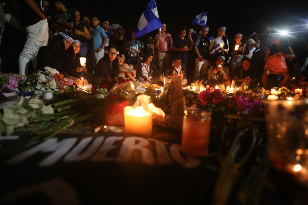 Demonstrators hold a candlelight vigil in honor of those who have died during anti-government protests in Managua, Nicaragua, Wednesday, April 25, 2018. On Sunday, President Daniel Ortega backed off a