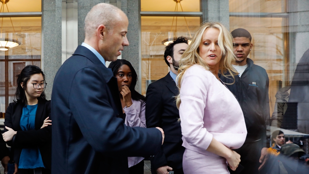 Cohen paid Daniels $130,000 to keep quiet about an alleged sexual encounter with Trump [Reuters]