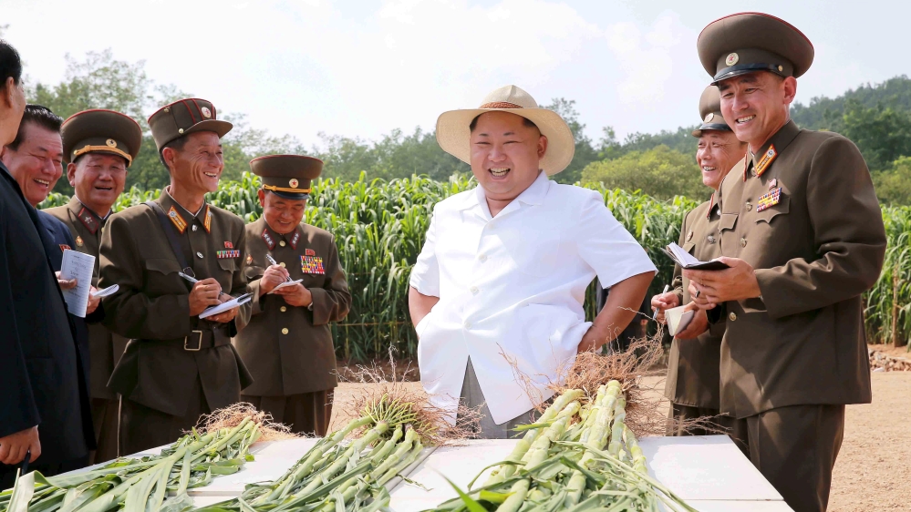 North Korean leader Kim Jong-un gives field guidance to Farm 1116 under the Korean People's Army Unit 810 in August 2015 [Reuters]