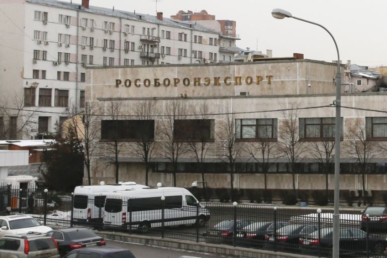 FILE PHOTO: Vehicles are parked near office building of Rosoboronexport company in Moscow