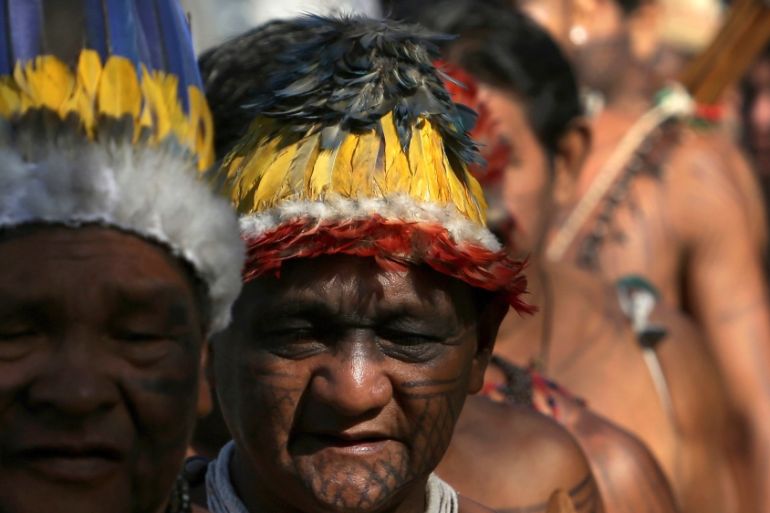 Munduruku indigenous men attend a protest in front of the Palace of Justice, Brasilia, Brazil, Tuesday, April 24, 2018 [Eraldo Peres/AP]