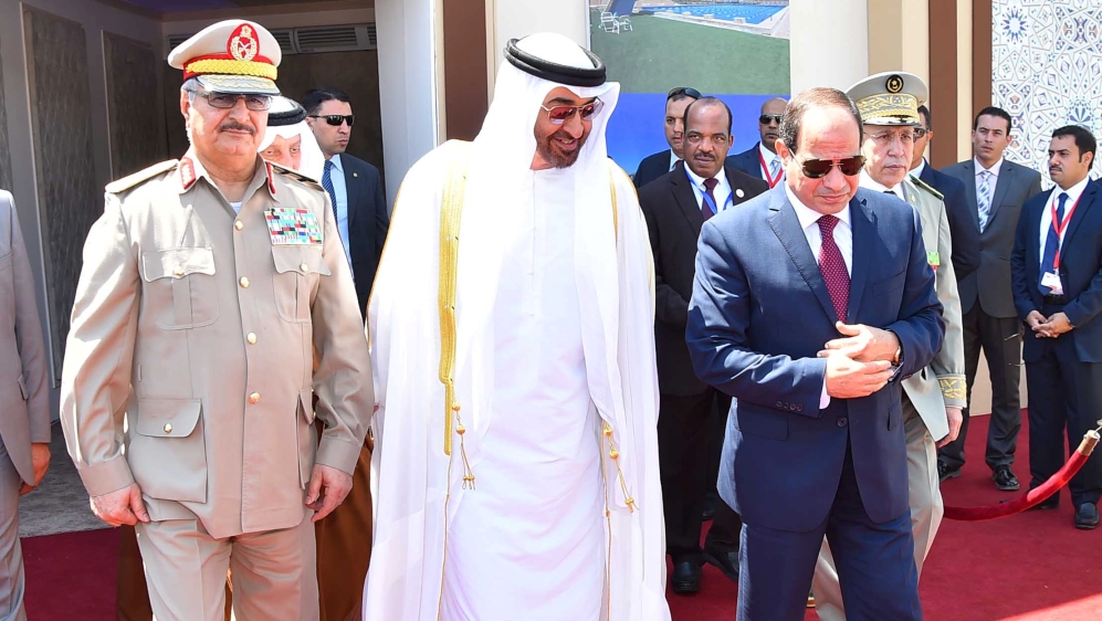 General Khalifa Haftar attends a military ceremony with Egyptian President Abdel Fattah al-Sisi, right, and Abu Dhabi Crown Prince Mohammed bin Zayed, centre, at the Mohamed Najib military base in Marsa Matrouh, Egypt on July 22, 2017 [File photo: Reuters]