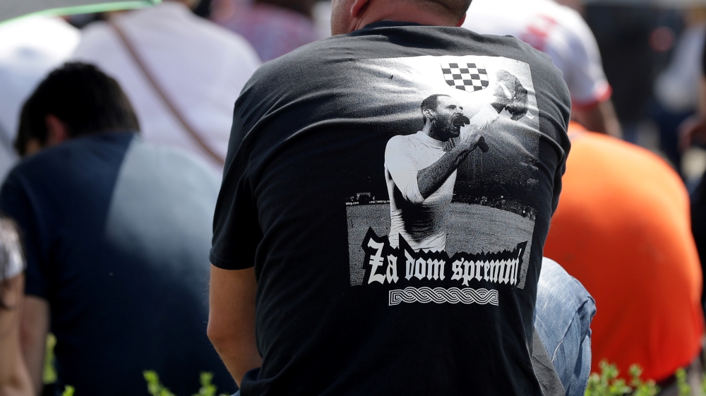 A participant wears a shirt that says 'Za Dom Spremni' (Ready for Homeland), a fascist slogan [Lisi Niesner/Reuters] 