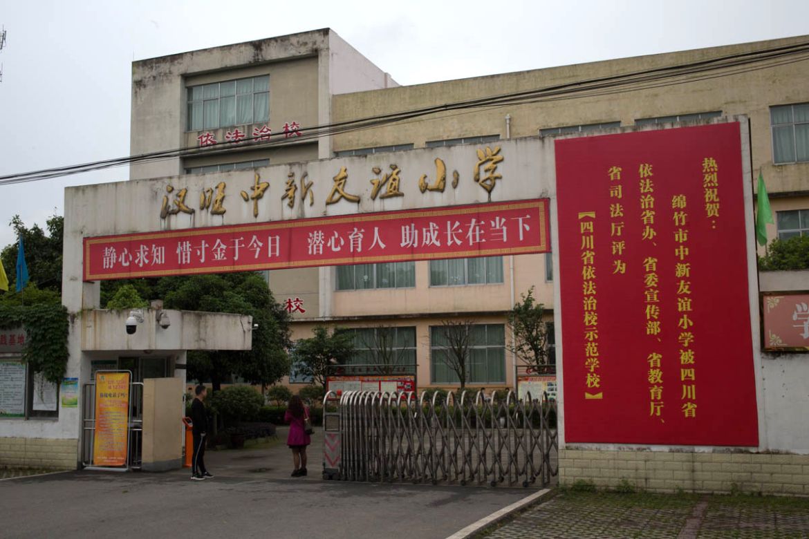 On the photo taken on May 10, 2018, a new school has been built about two years after his son died in his collapsed school building. Zhao said the quality of the new school buildings is a lot better
