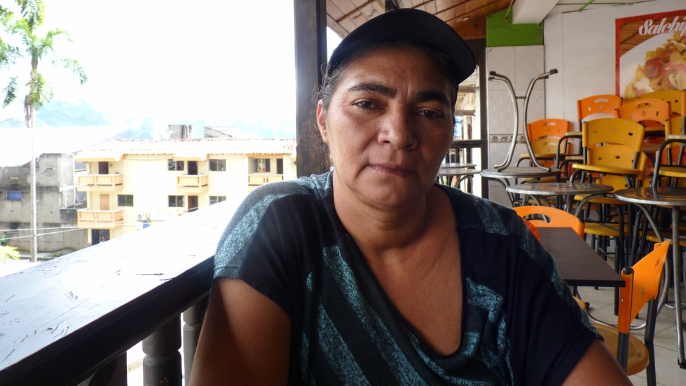 Ruby Posada escaped from her home on her son's back when the waters reached waist height [Mary Atkinson/Al Jazeera]