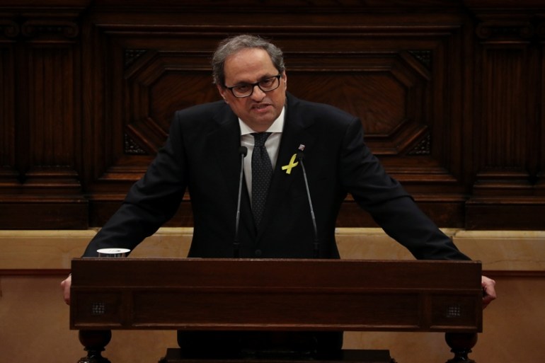 Quim Torra, delivers a speech at the start of an investiture debate at the regional parliament in Barcelona, Spain, May 14, 2018. [Albert Gea/Reuter