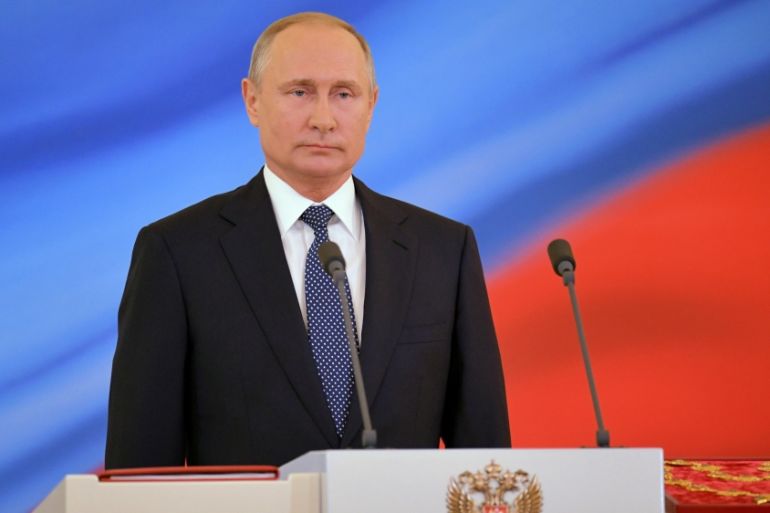 Vladimir Putin is sworn as Russian President during an inauguration ceremony at the Kremlin in Moscow
