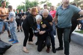 Mayor of Thessaloniki, Yiannis Boutaris is aided after being attacked by a group of nationalists during a Sunday commemoration of what is known as the genocide of the Pontians, on 19 May 2018 [EPA]